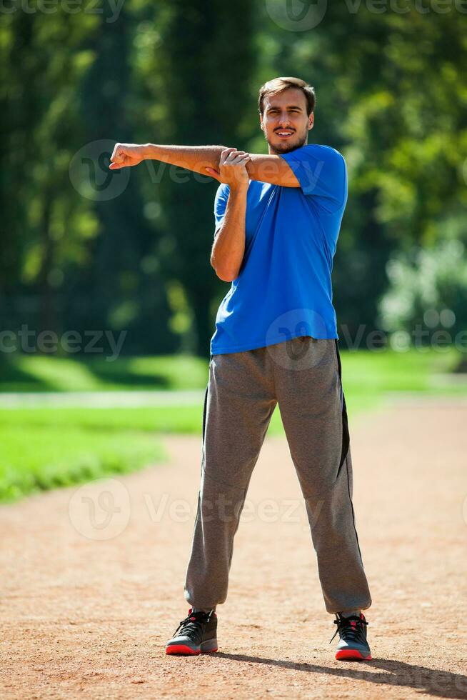 A man doing physical exercises photo