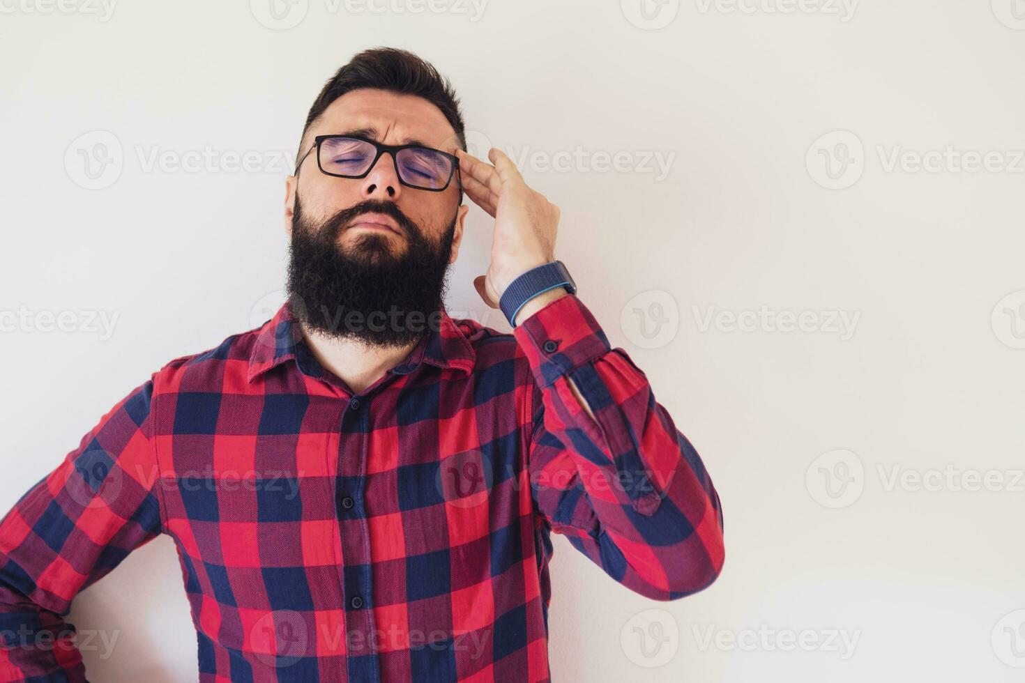 Portrait of a man who has a headache photo