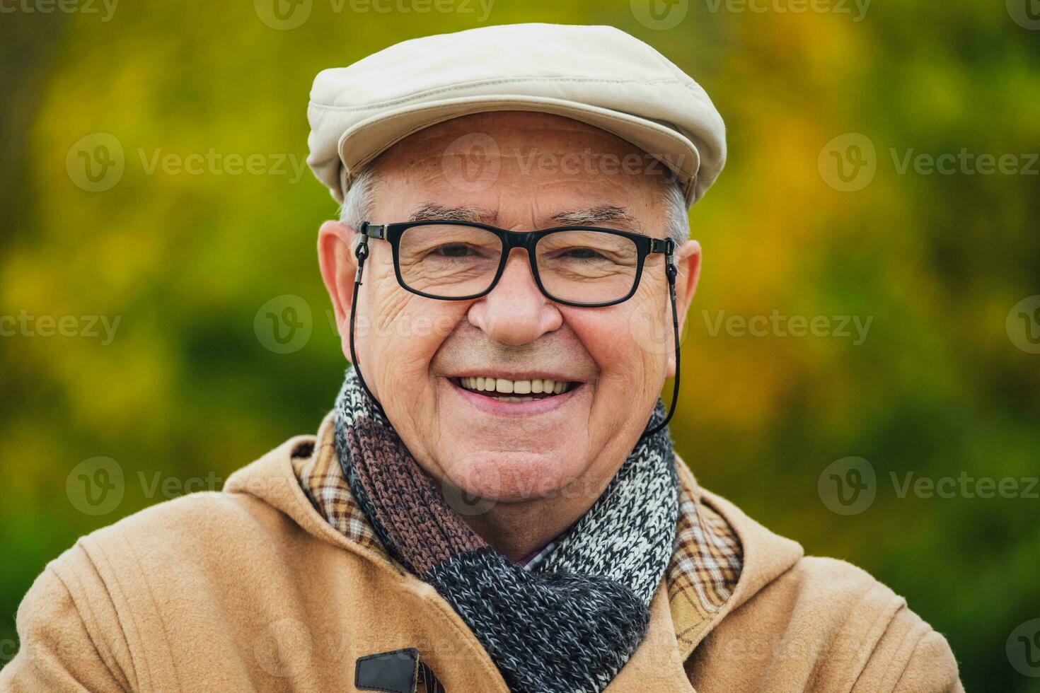 Outdoor portrait of a senior man in winter coat photo