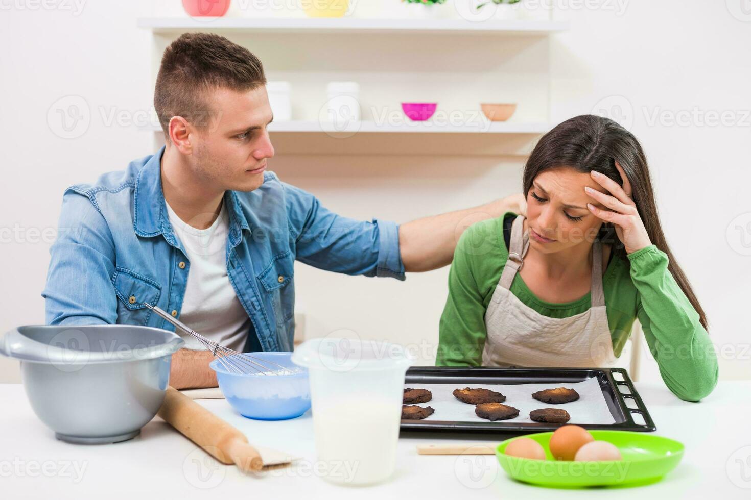 A couple cooking together photo