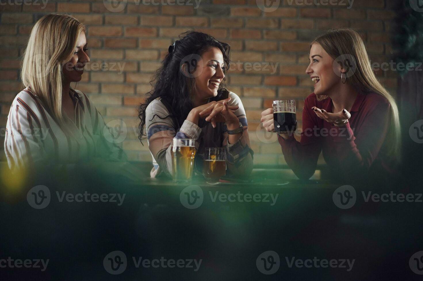 Friends having fun at the bar photo