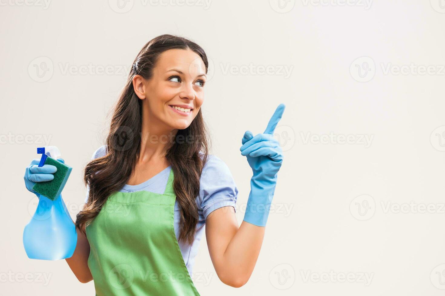 A woman who is going to clean the house photo