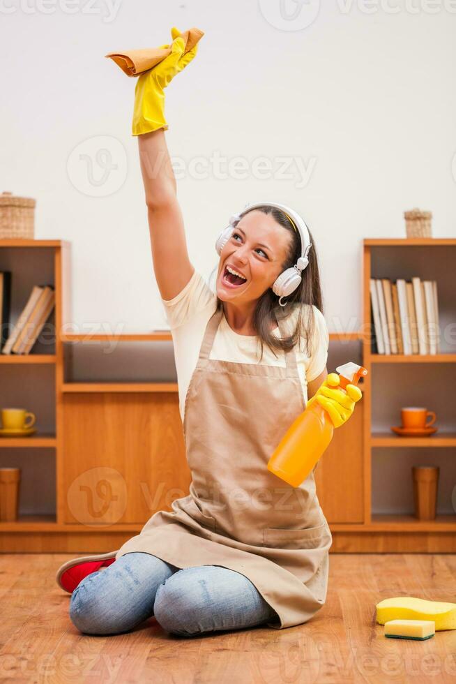 A woman cleaning the house photo