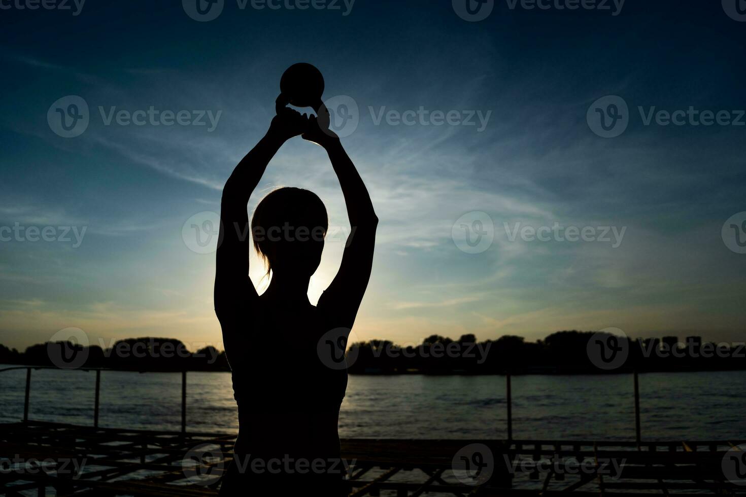 A woman doing physical exercises photo