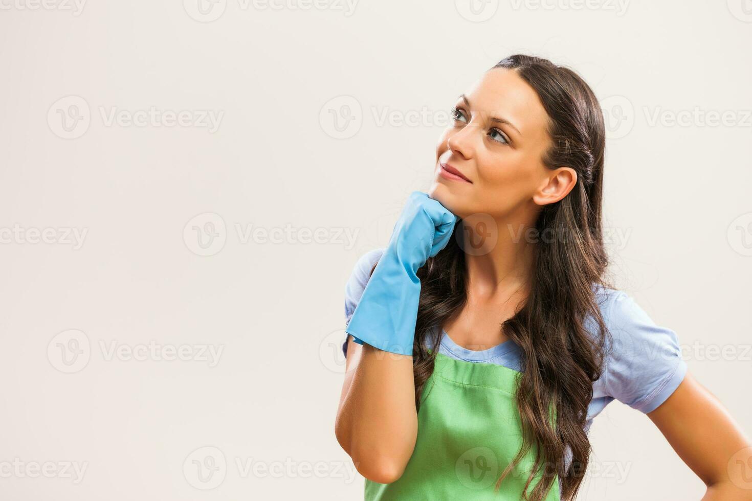 A woman ready to start cleaning photo