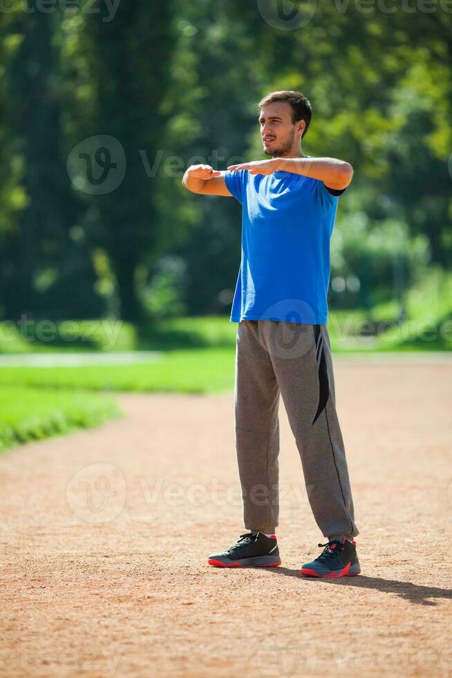 A man doing physical exercises photo