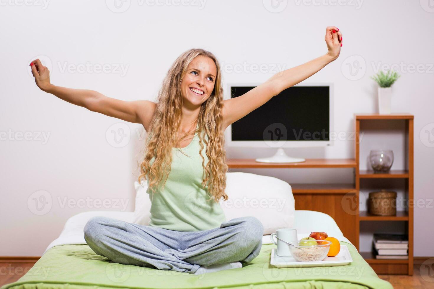 A woman in her bedroom photo