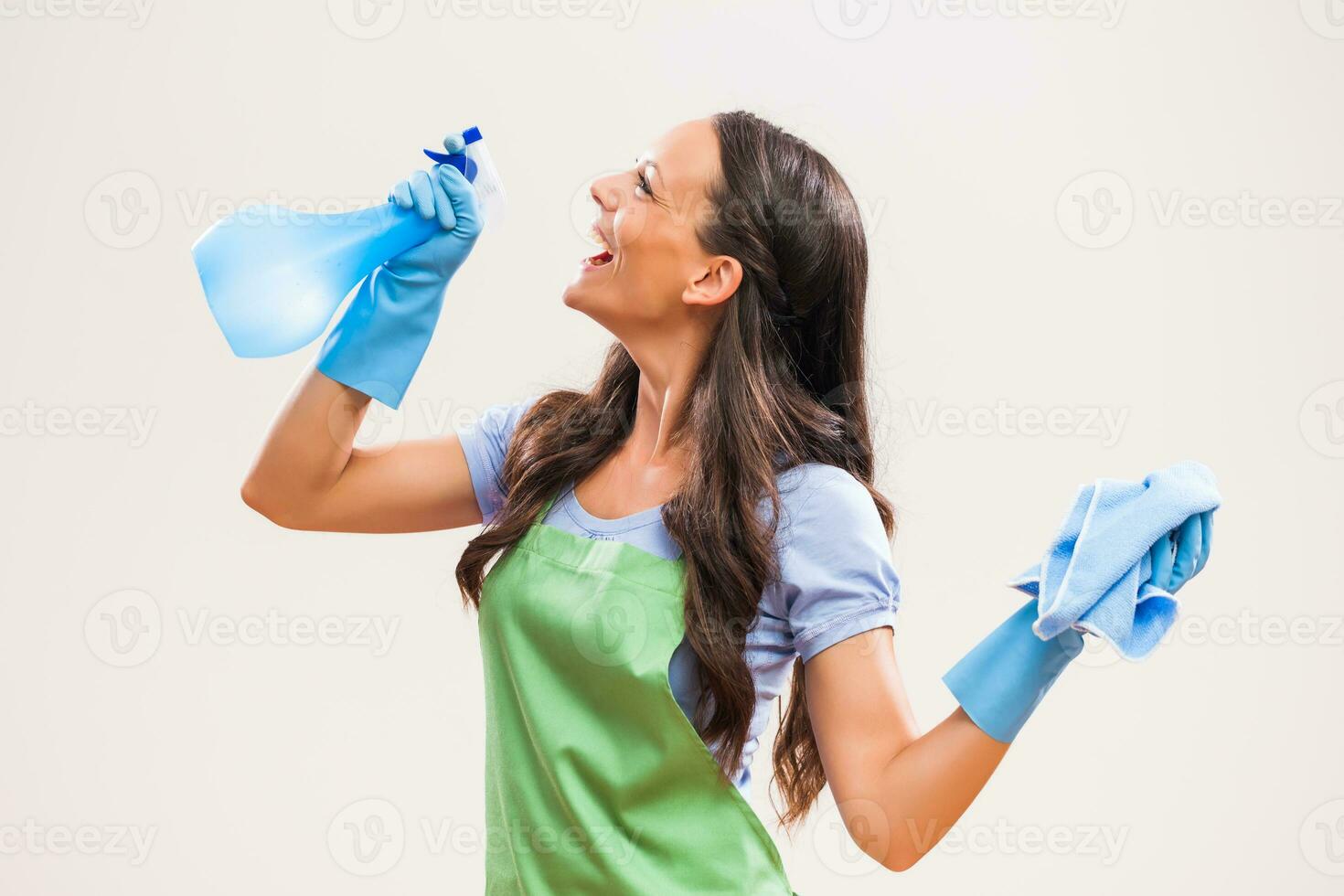 A woman who is going to clean the house photo