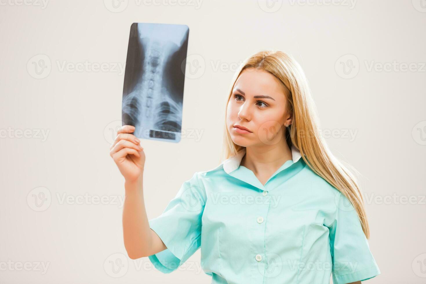 Portrait of a nurse with x-ray photo