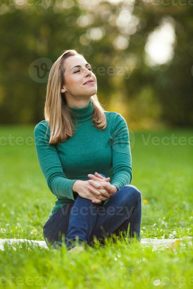 A woman spending time outdoors photo