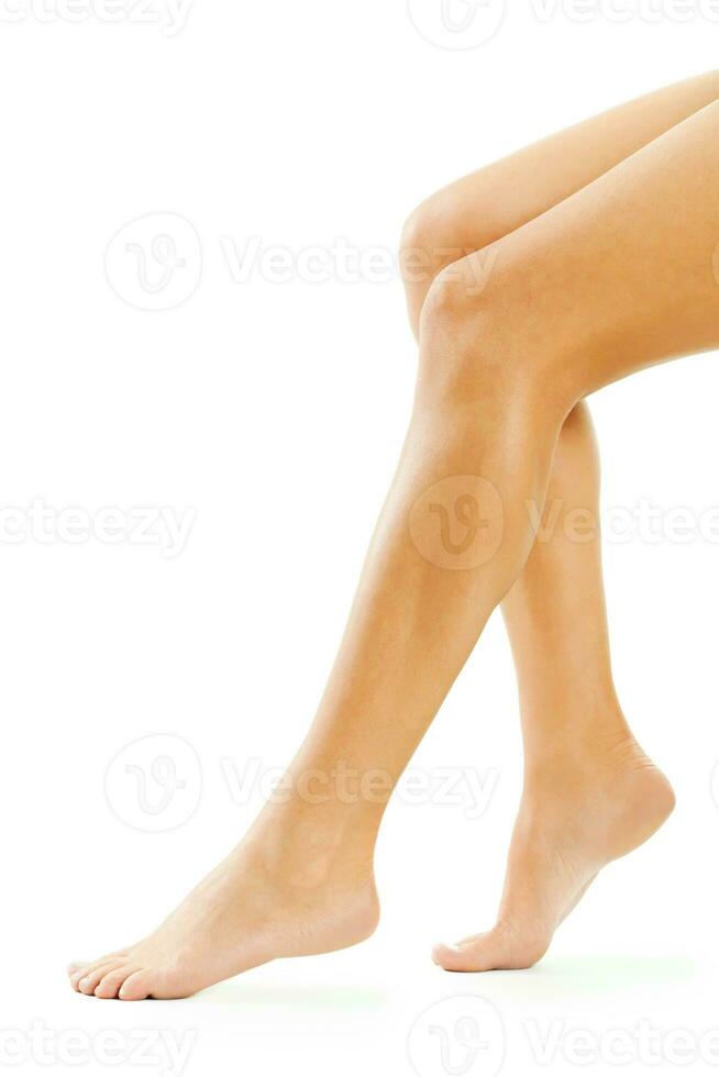 A woman taking care of her feet photo