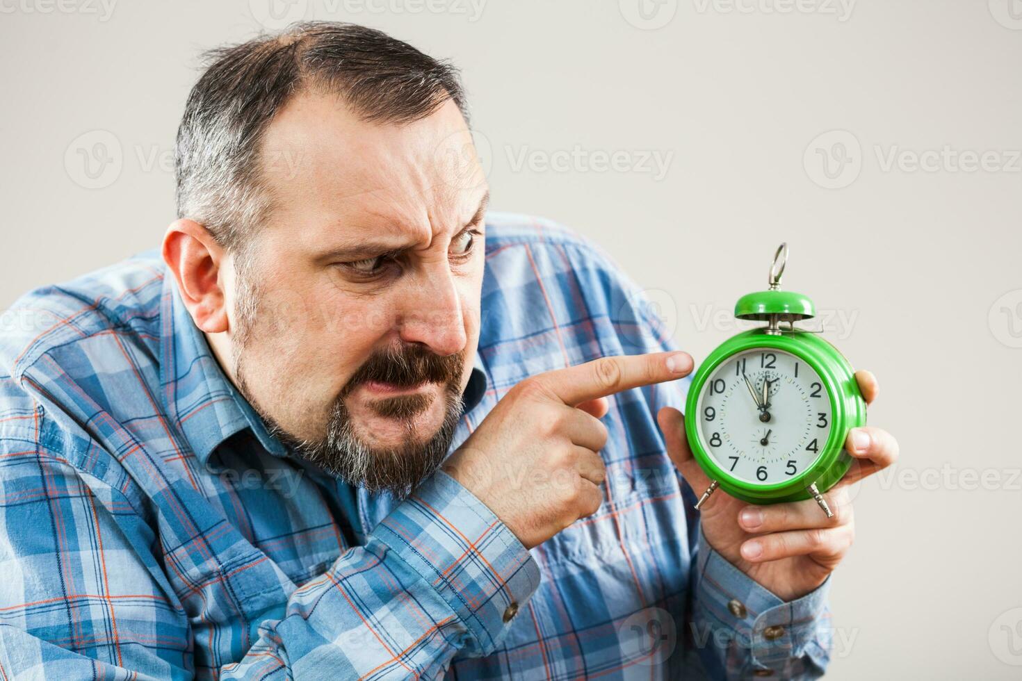A man with a clock photo