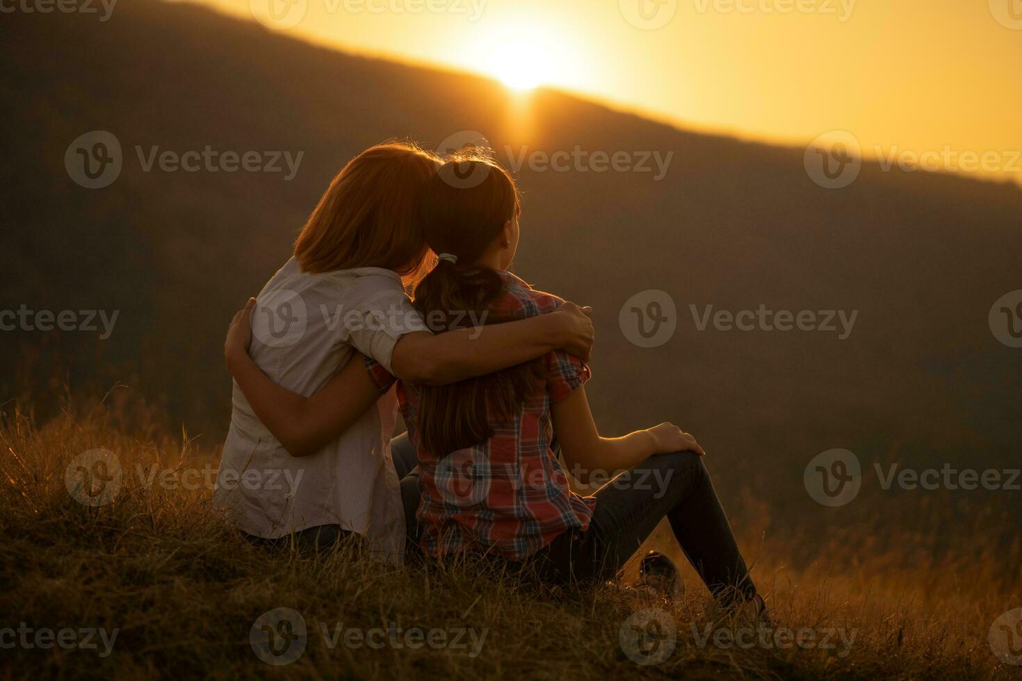 Grandmother and granddaughter spending time outdoors photo