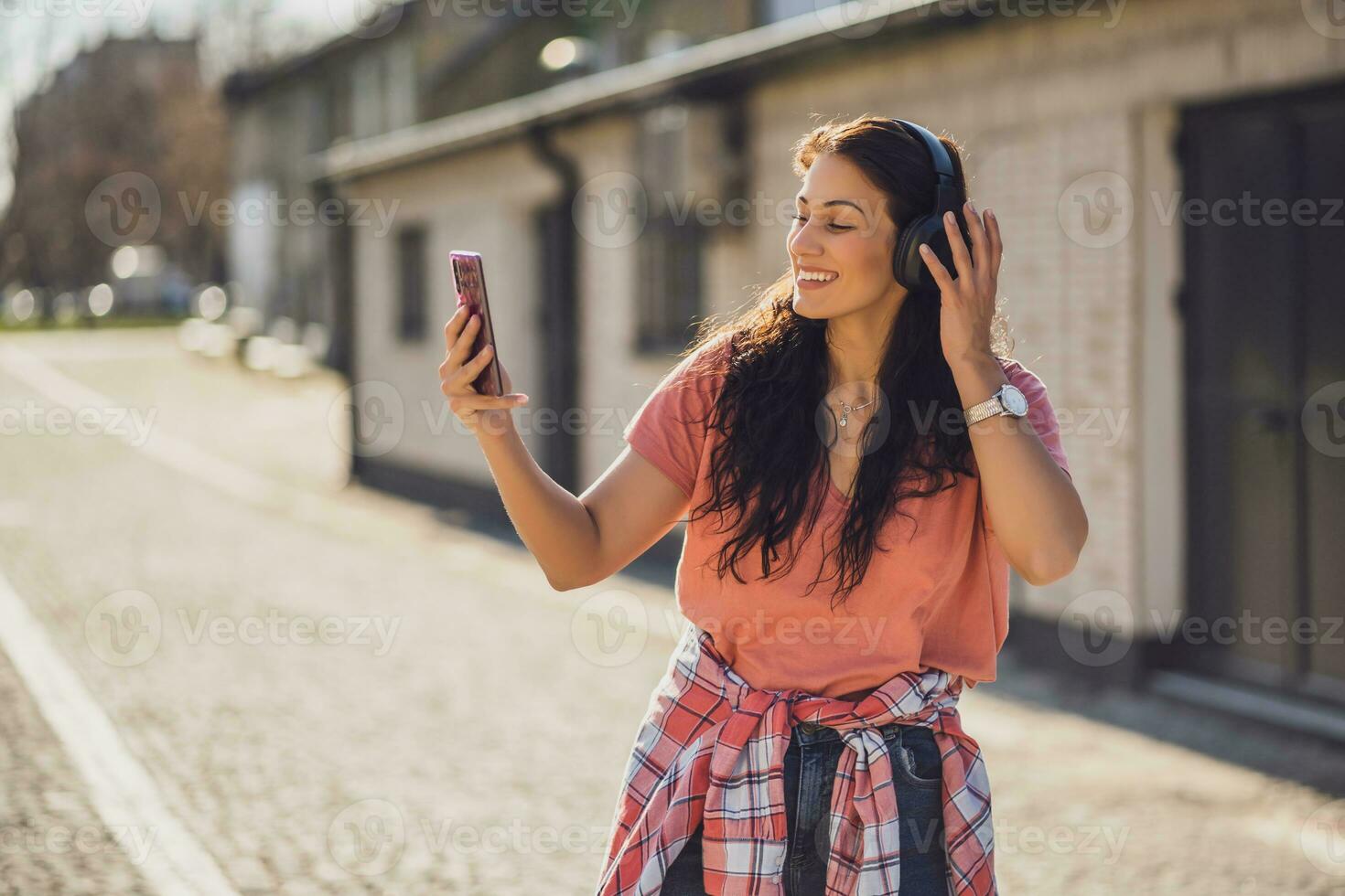 A woman listening to music photo