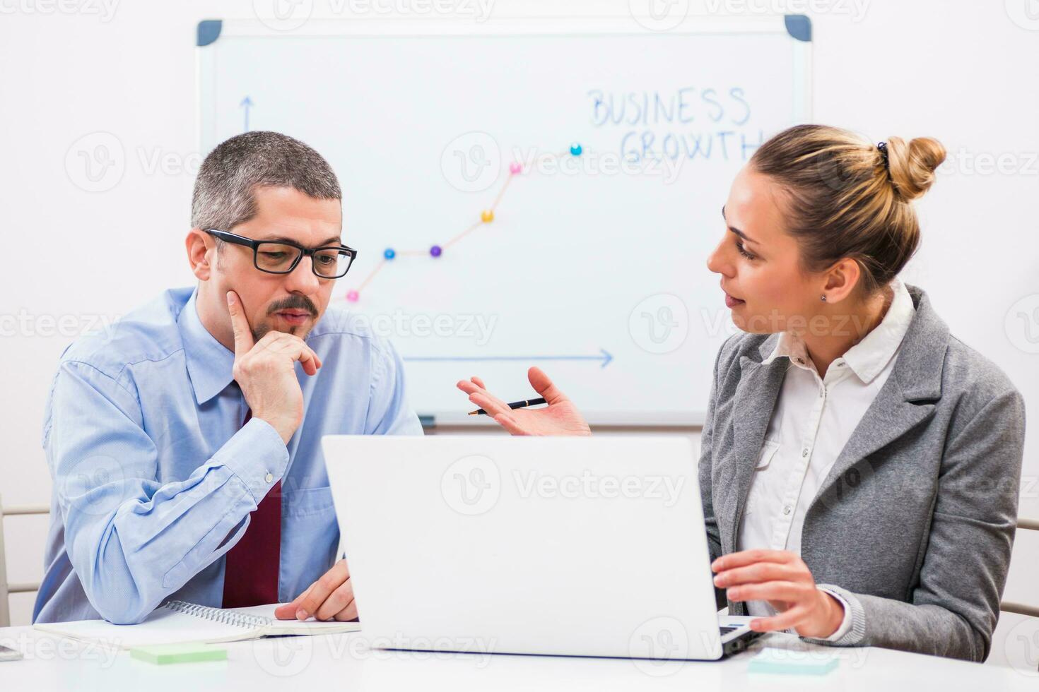 Business people discussing a business strategy photo