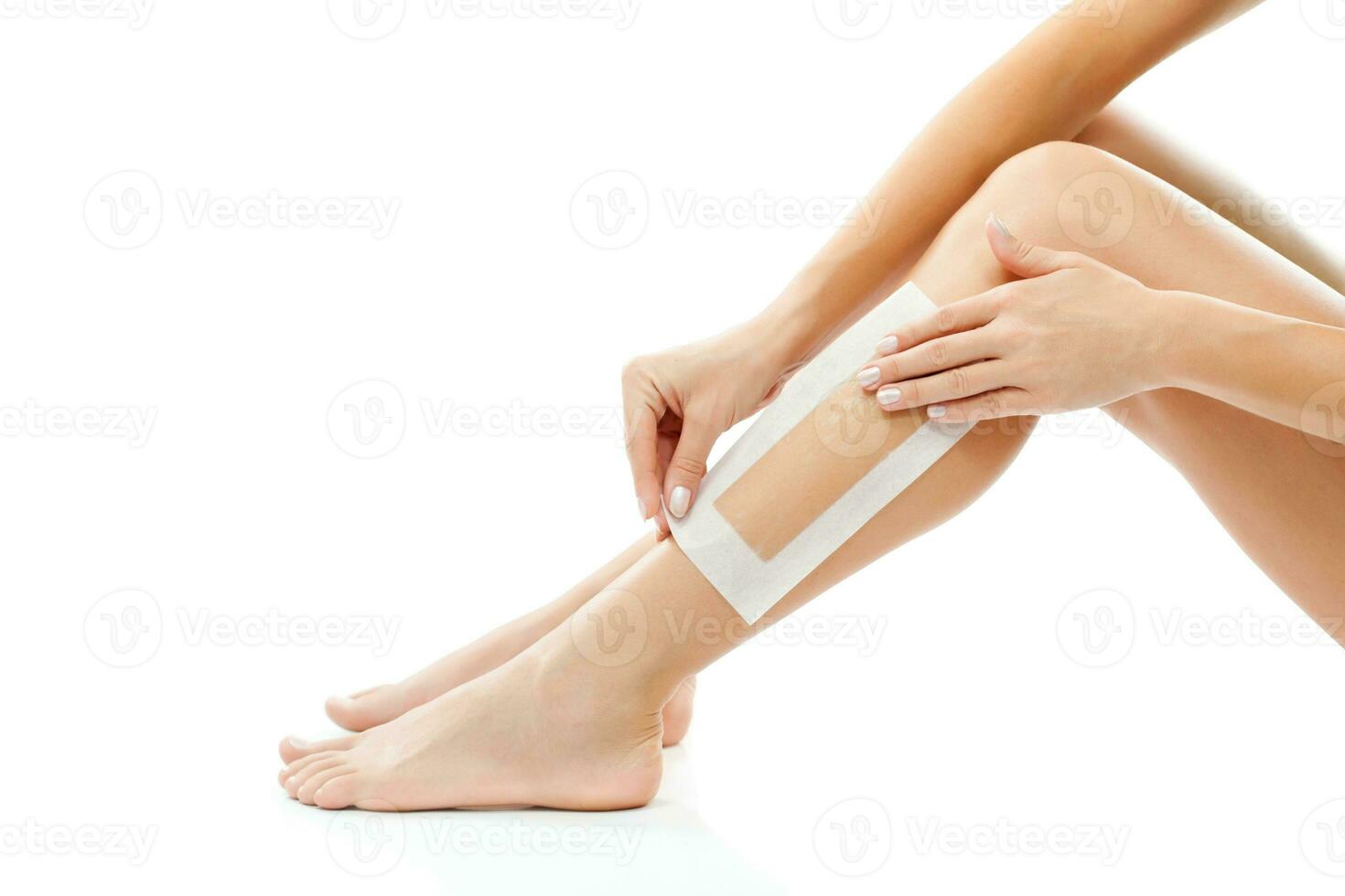 A woman taking care of her feet photo