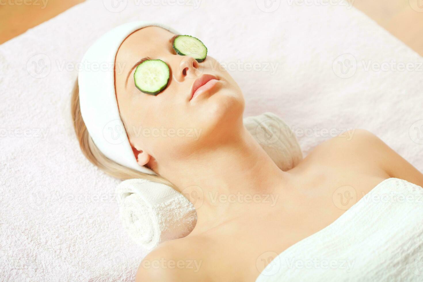 A woman having a facial treatment photo