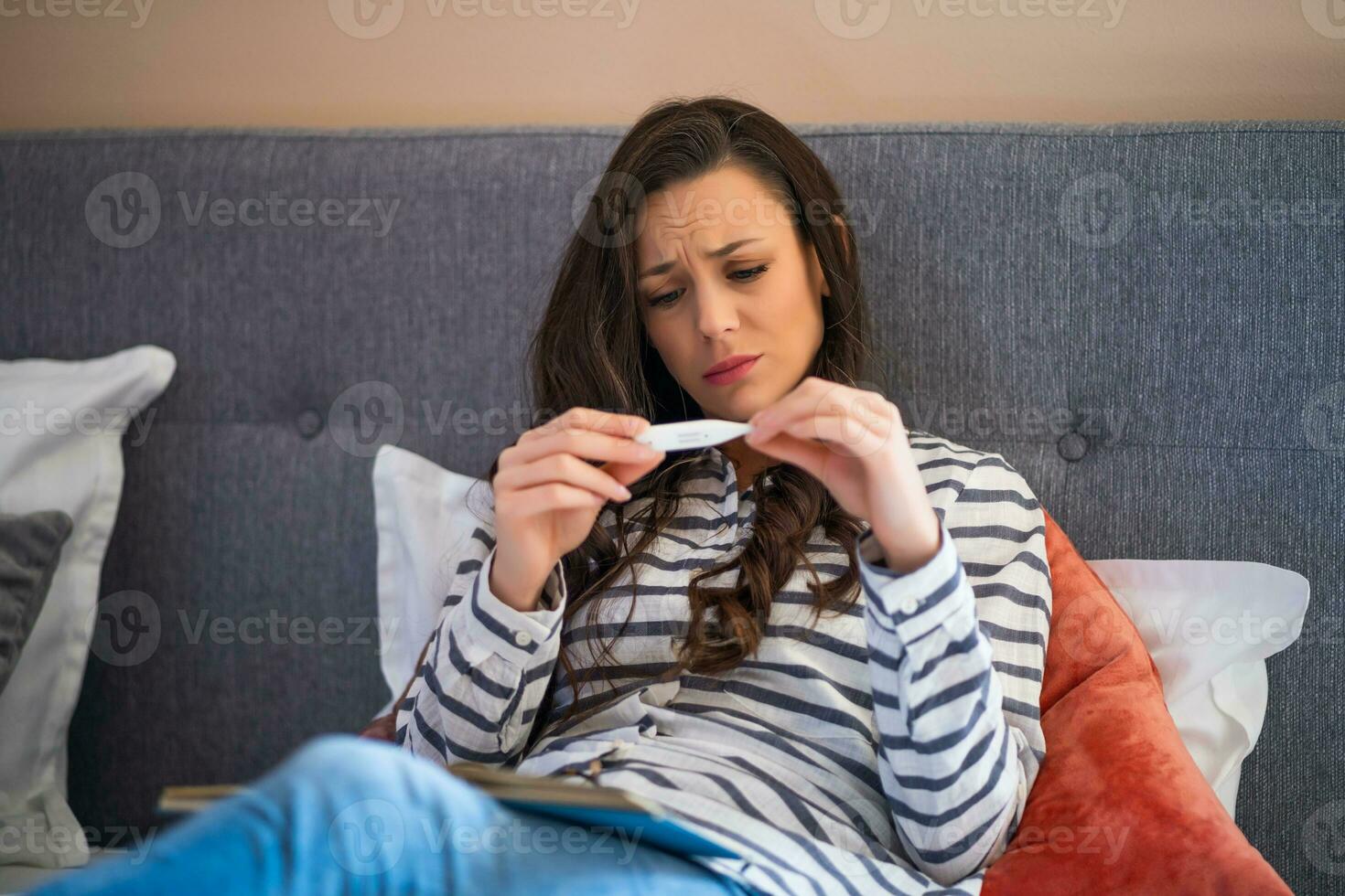 A woman who is sick photo