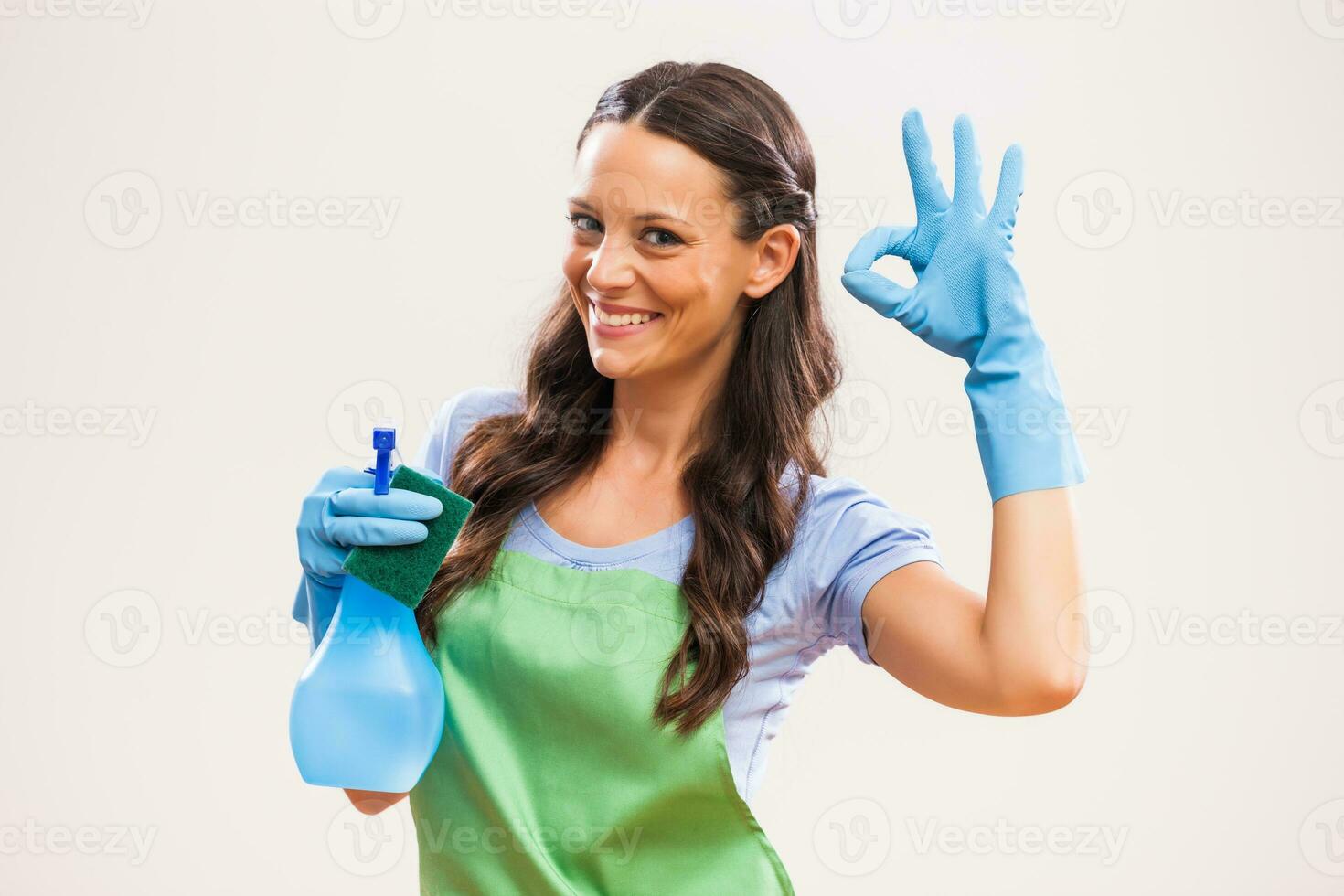 A woman who is going to clean the house photo