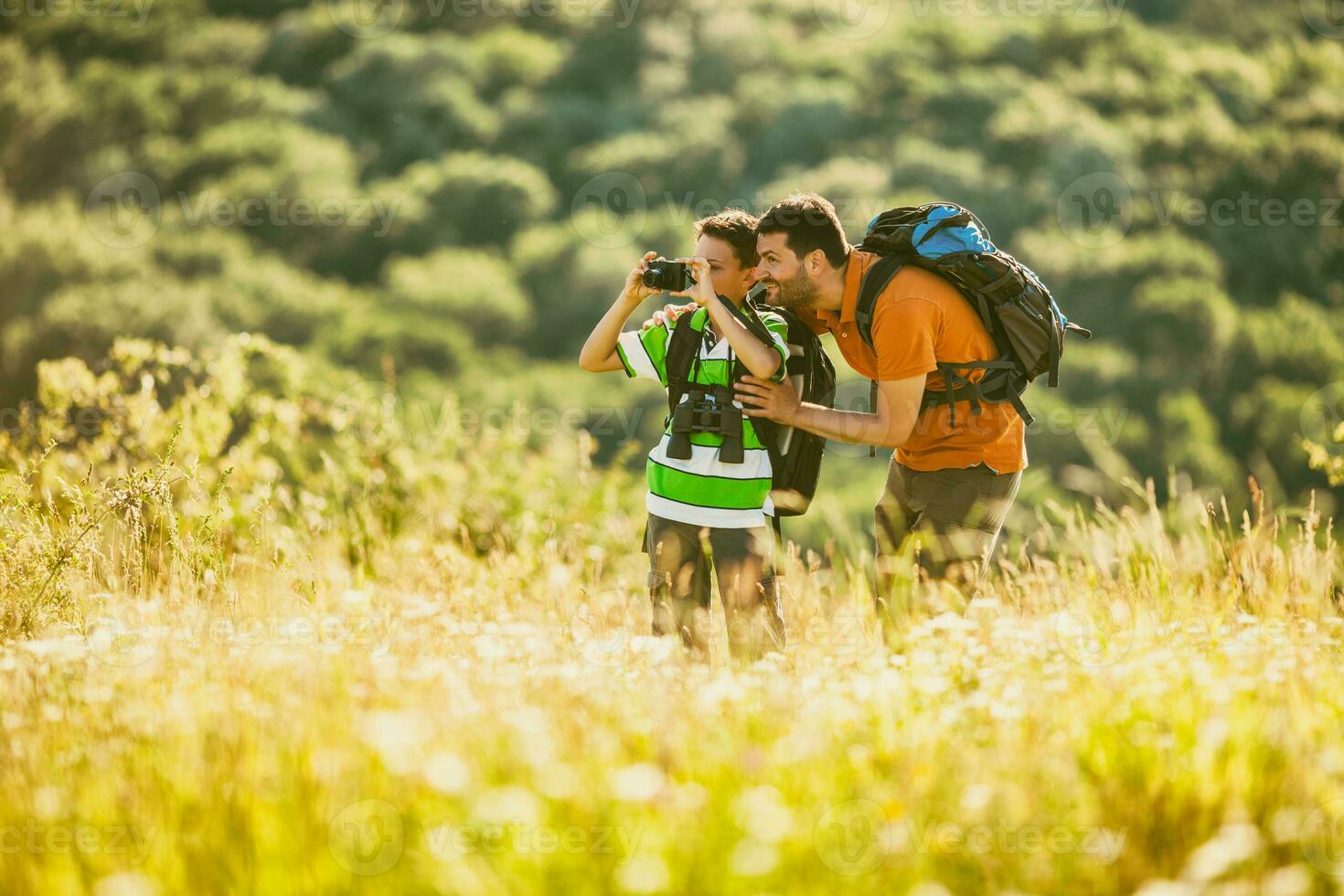 Father and son hiking photo