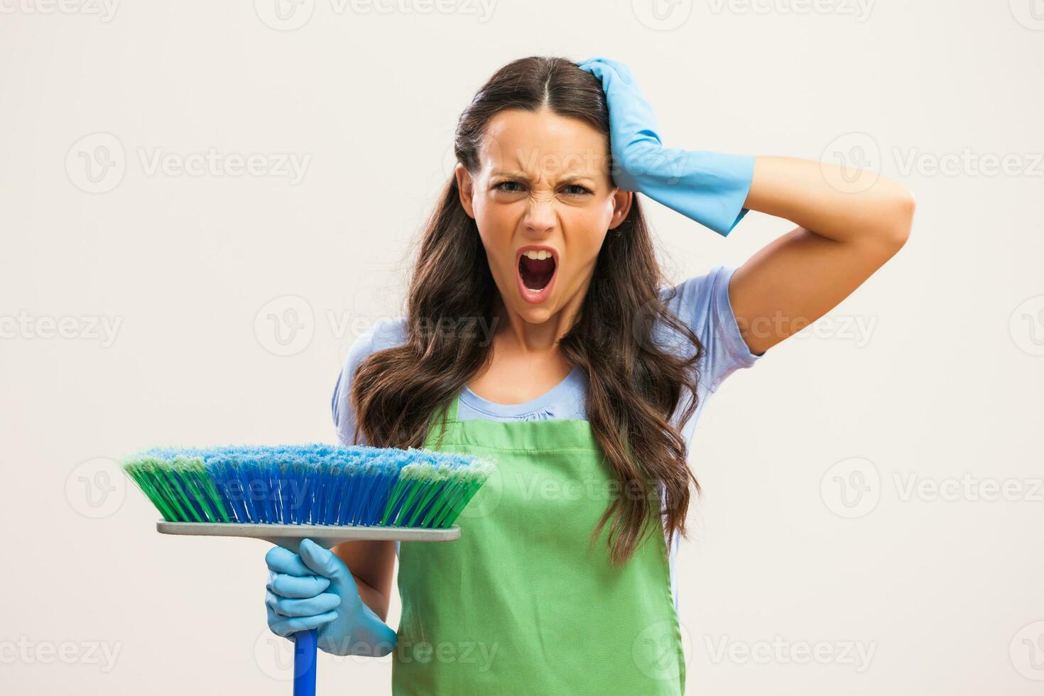 A woman who is going to clean the house photo