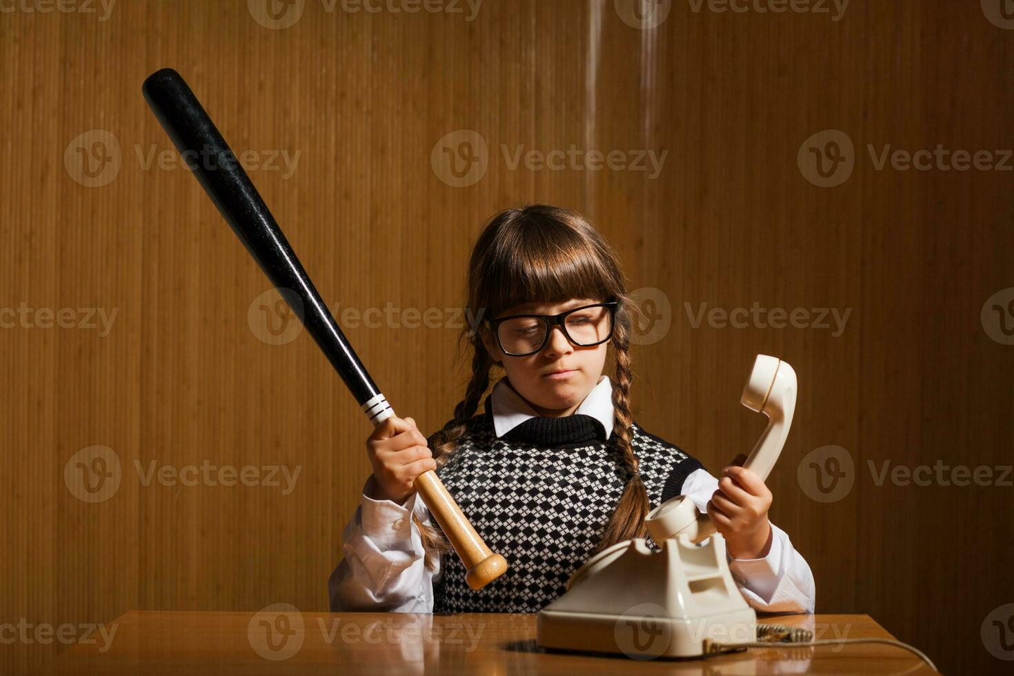 A girl who is mad at the telephone photo
