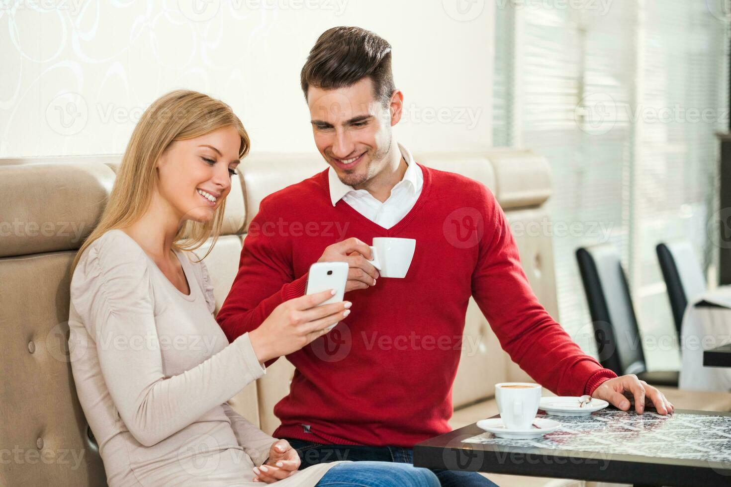 A couple in a coffee shop photo