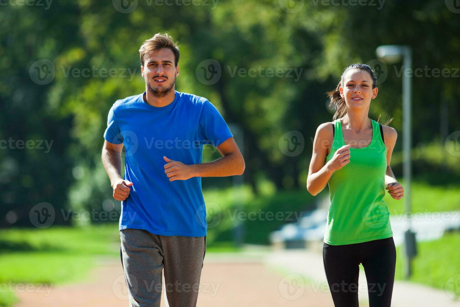 People running in the park photo