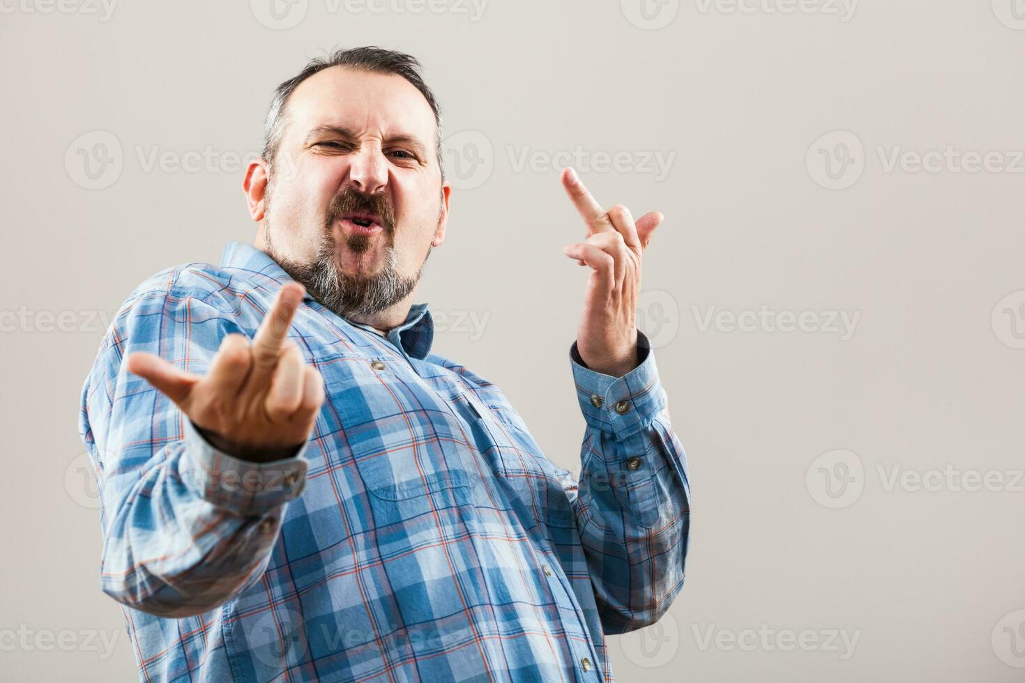 Portrait of a man with blue plaid shirt photo