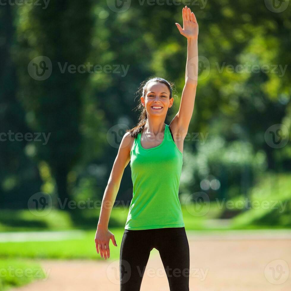 A woman doing physical exercises photo
