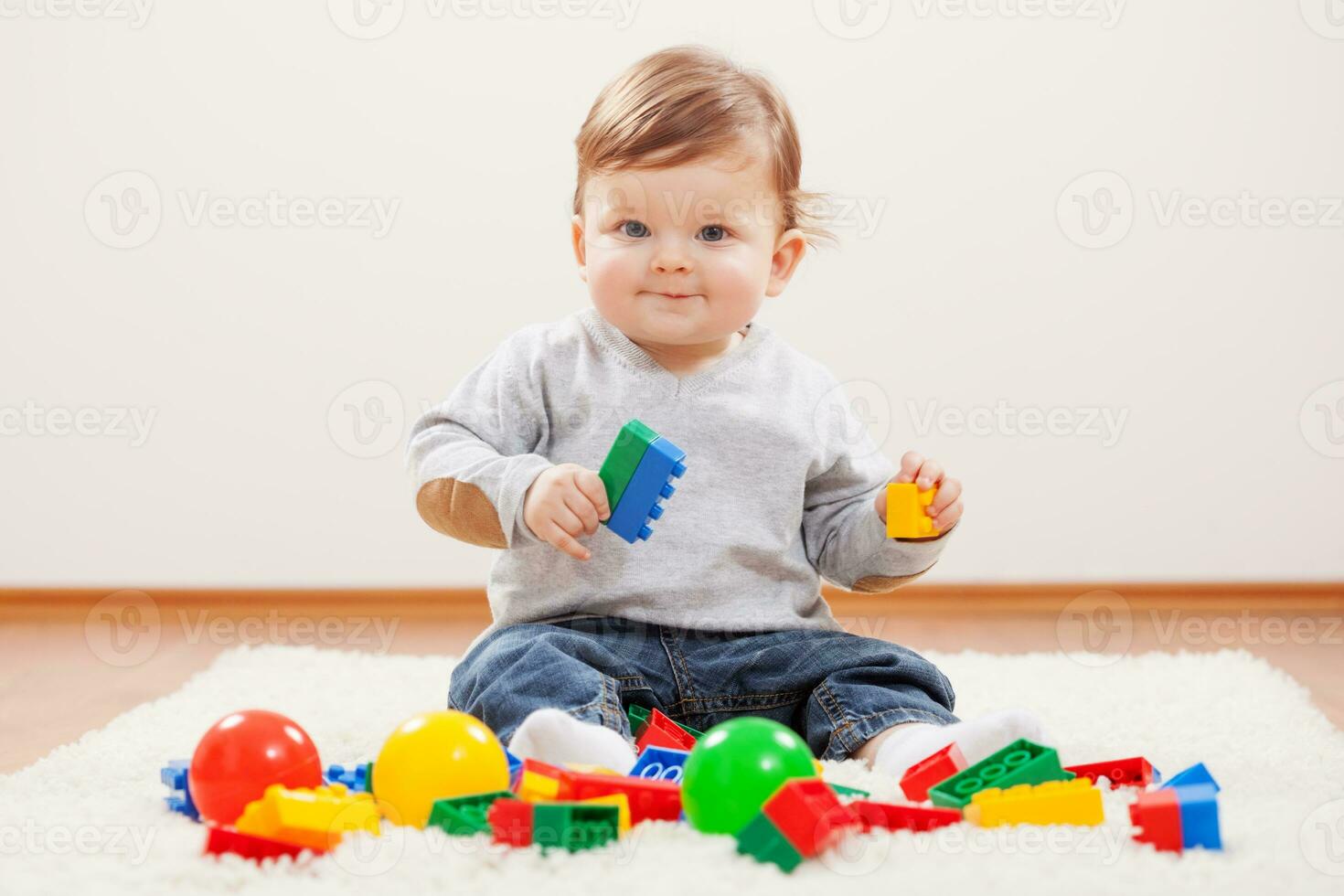 Child playing with toys photo
