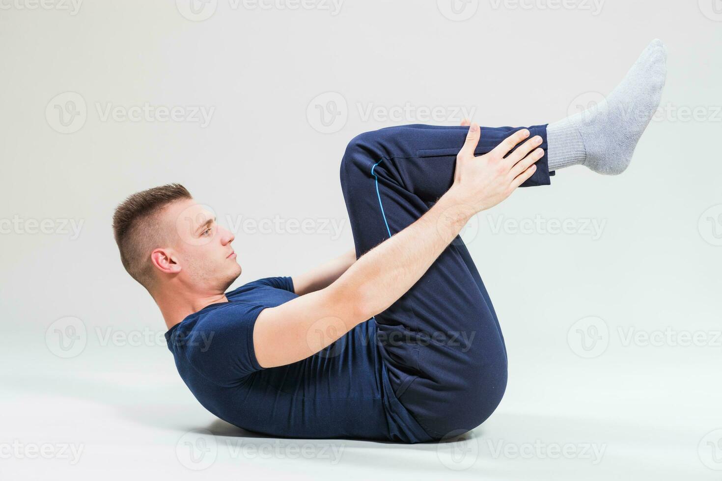 A man doing physical exercises photo