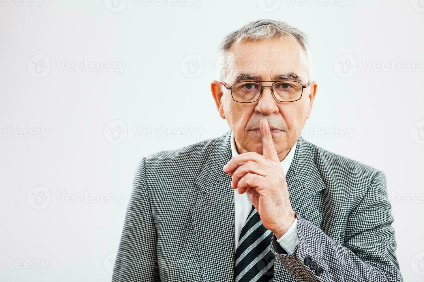 Portrait of a serious senior businessman photo