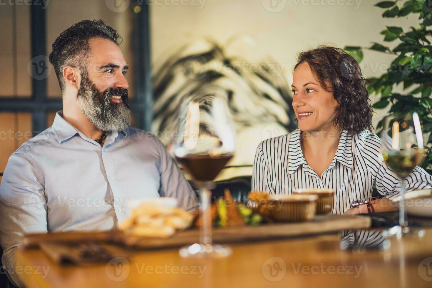 A couple having dinner photo