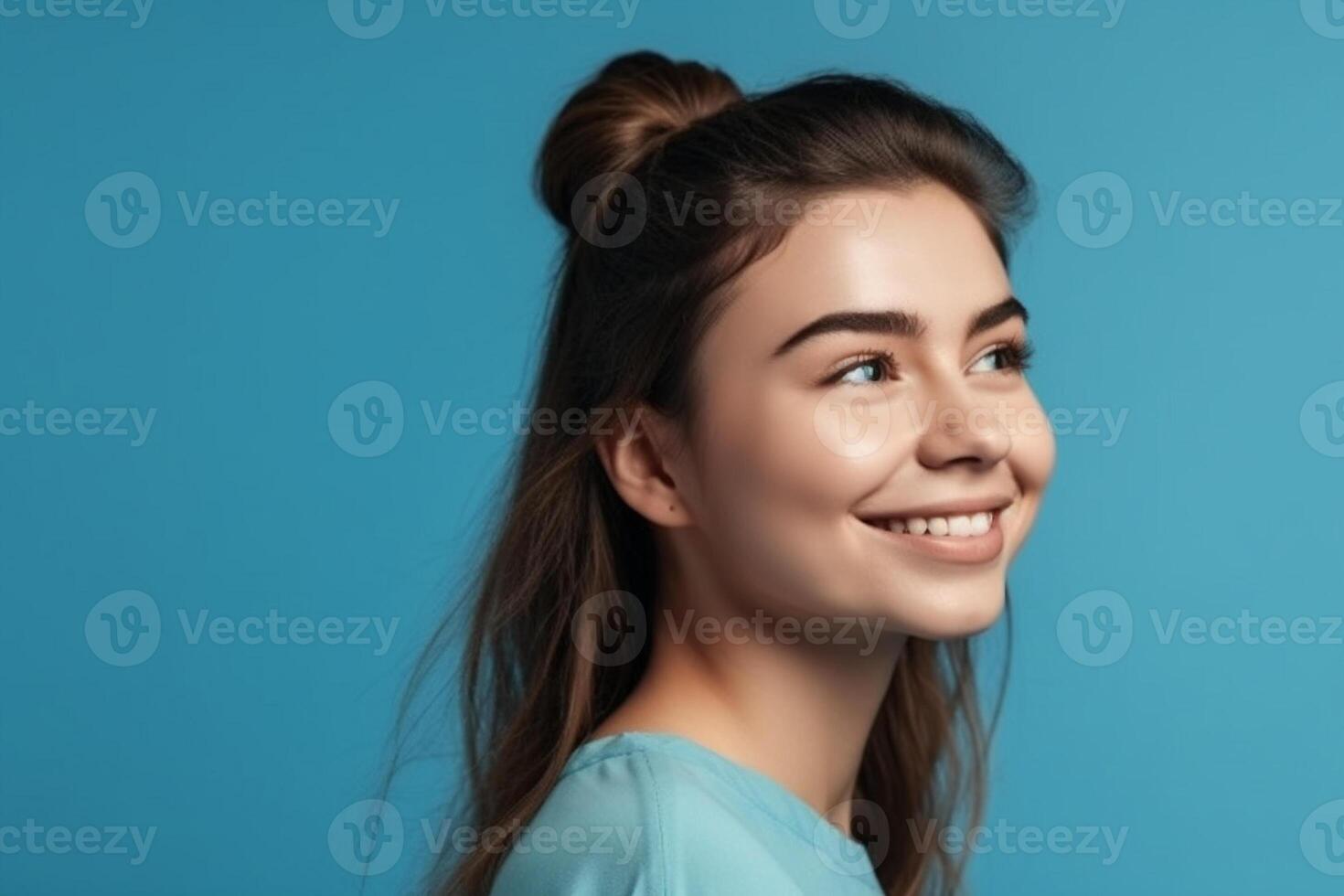 Profile side view portrait of attractive cheerful girl demonstrating copy space ad new isolated over bright blue color background, photo