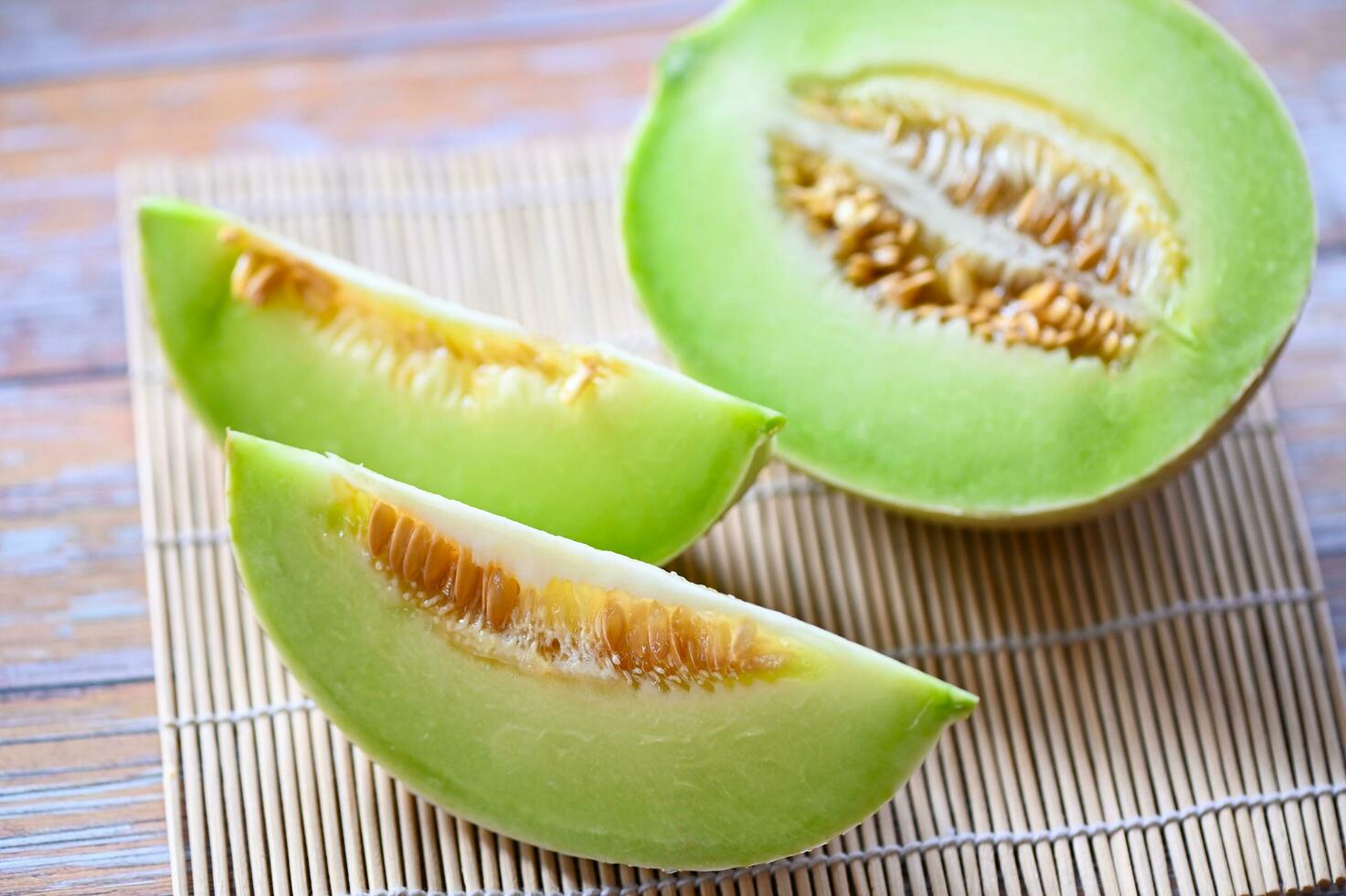 cantaloupe melon on plate wooden, cantaloupe thai slice fruit for health green cantaloupe thailand photo
