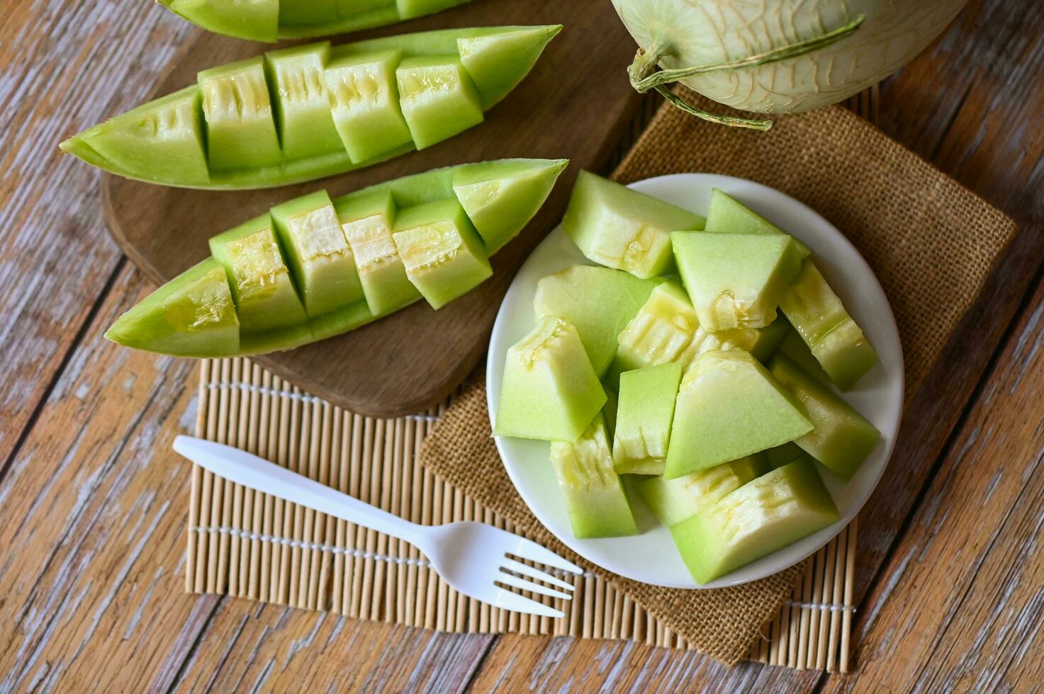 cantaloupe melon on plate wooden, cantaloupe thai slice fruit for health green cantaloupe thailand photo
