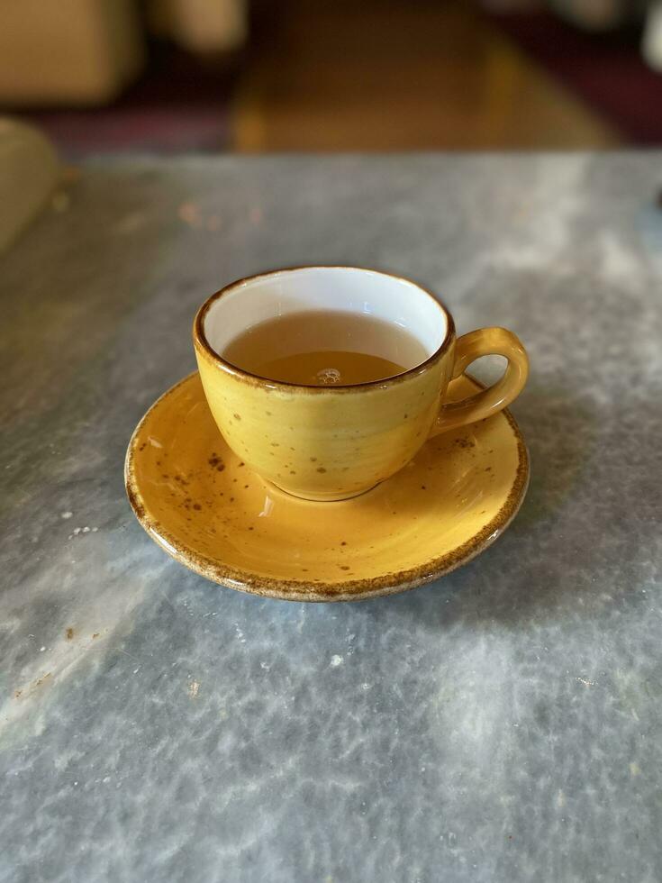 Tea cup on table photo