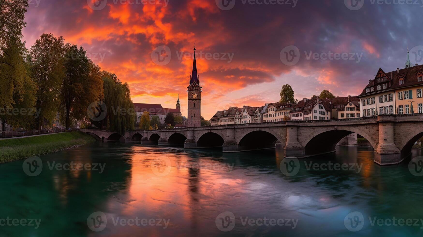 Incredible vivid cityscape. Scenic view Historical Old Town of Bern city with colorful sky, view on bridge over Aare river and church tower during dramatic sunset. photo