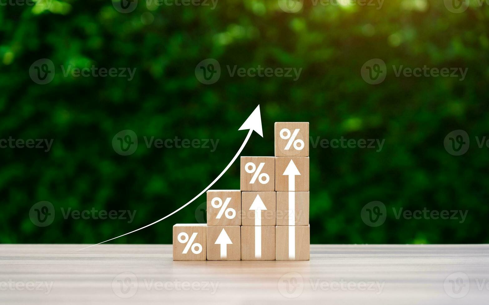 Interest rate financial and mortgage rates concept. Wooden blocks with Icon percentage symbol and arrow pointing up. company business growth and sales, interest rate, tax, real estate photo