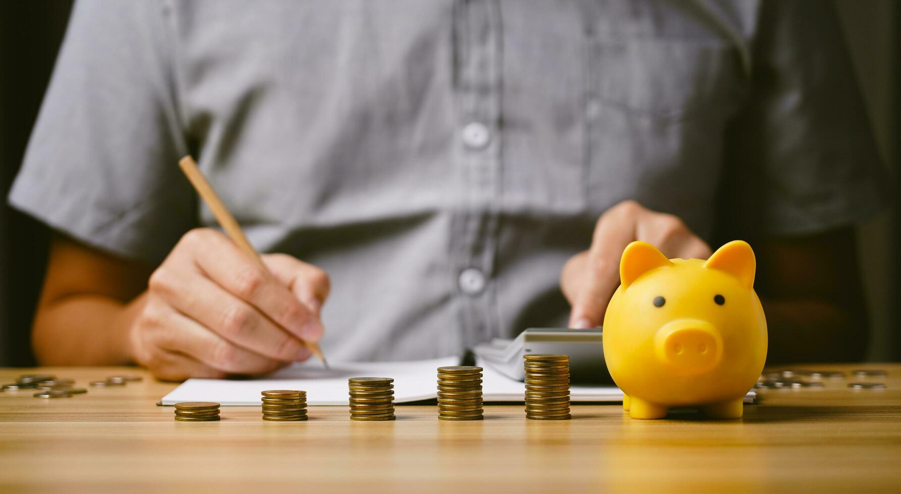 Concept money saving planning for future costs, fixed deposit account, fixed investment mutual funds, study various investments. Businessman collects money and saves financial accounts photo