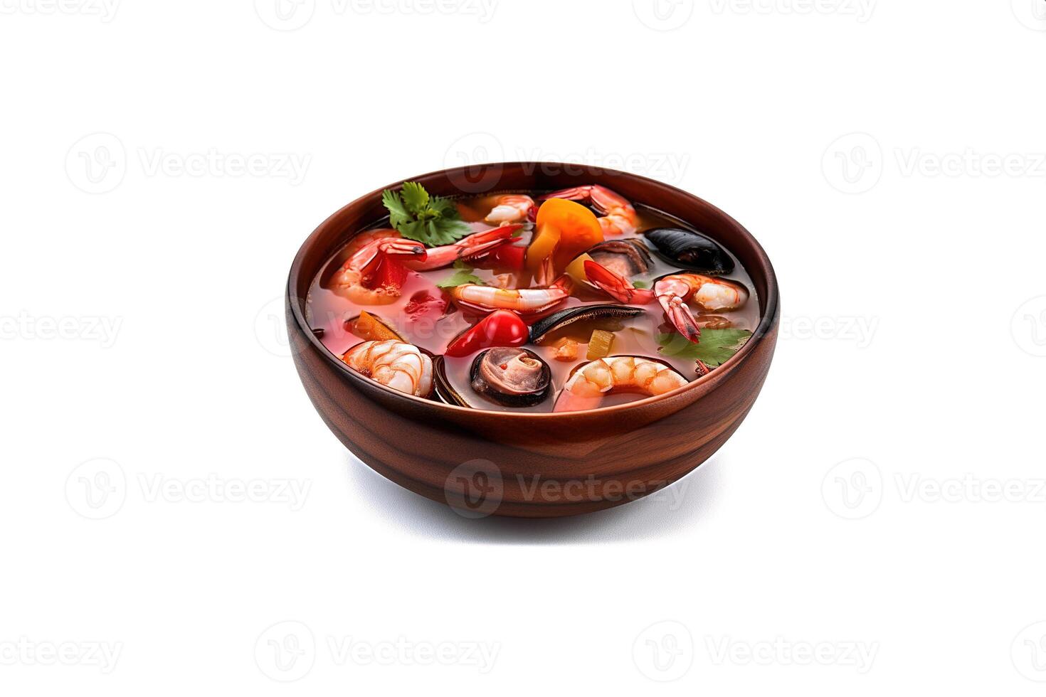 Delicious a bowl of Thai soup Tom Yam Kung with shrimps and clams isolated on white background. photo