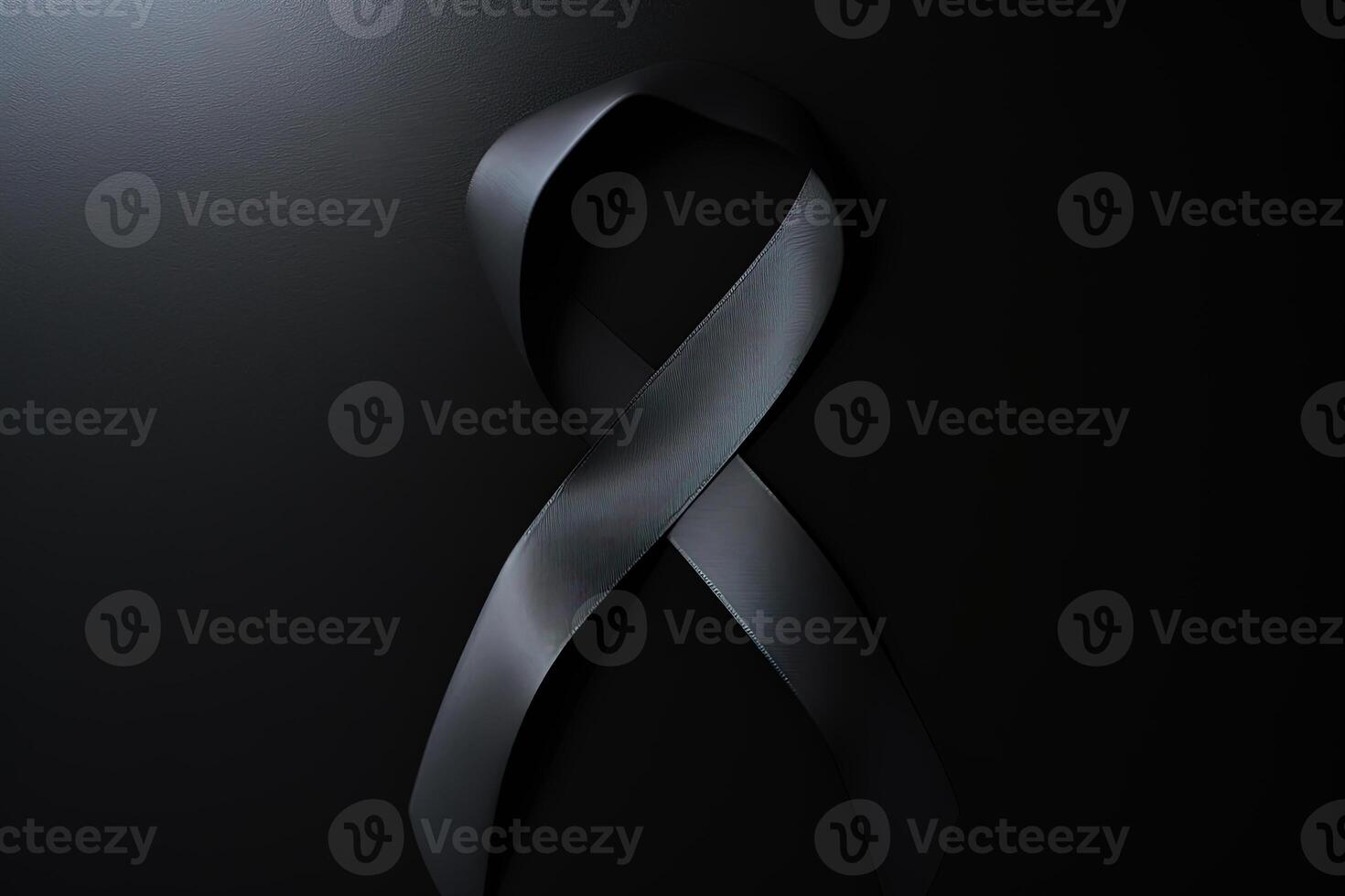 Black mourning ribbon with a dark background. photo