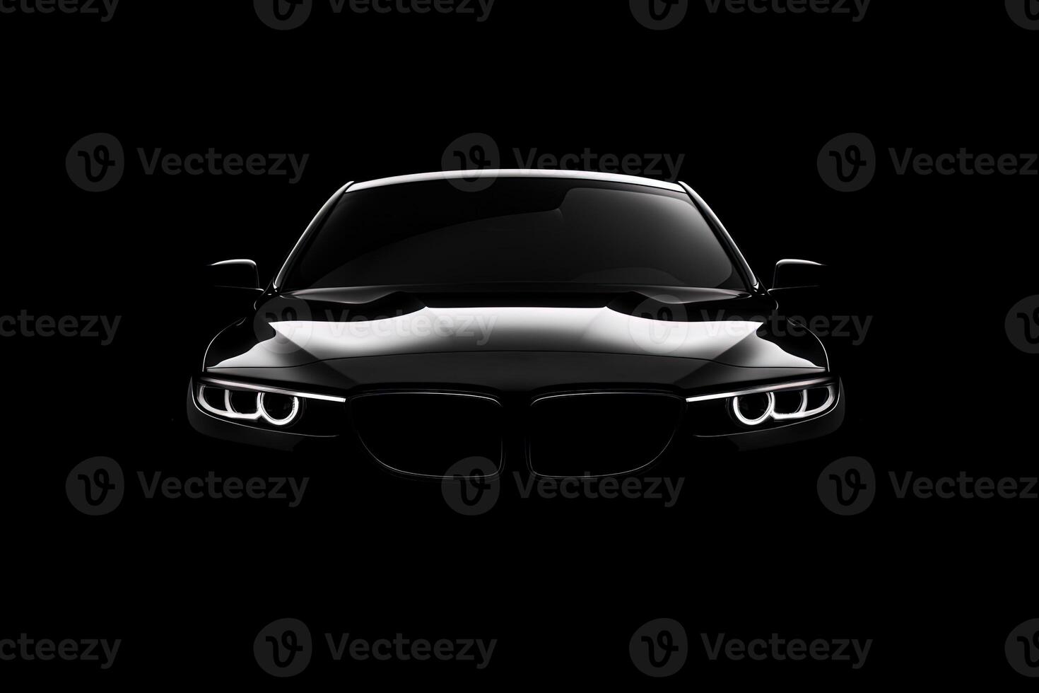 Front view dark silhouette of a modern luxury black car isolated on black background. photo