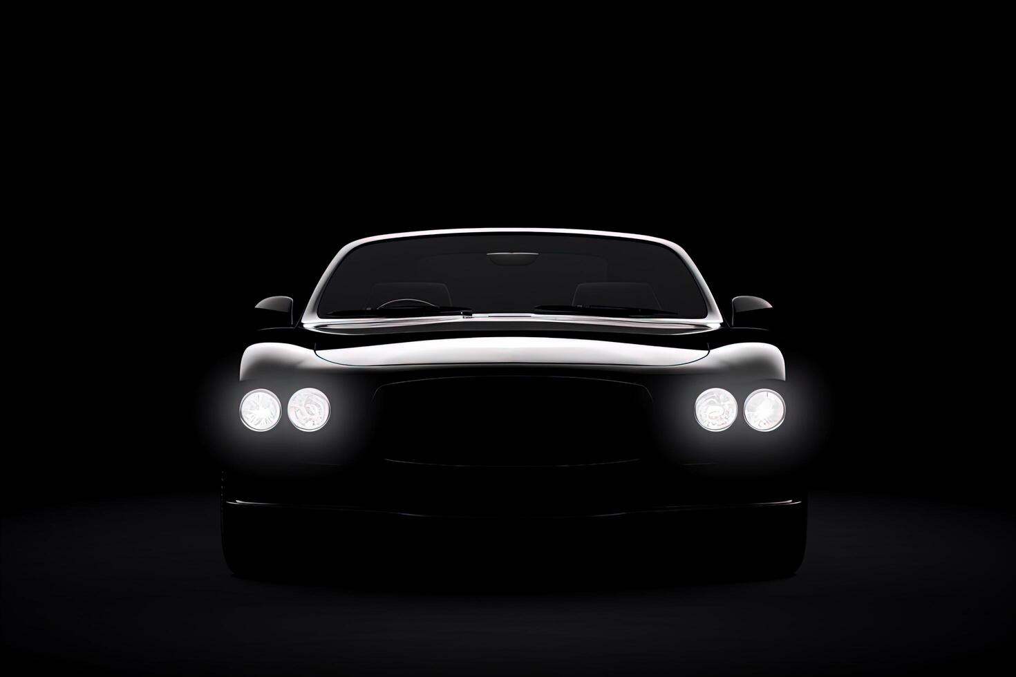 Front view dark silhouette of a modern luxury black car isolated on black background. photo