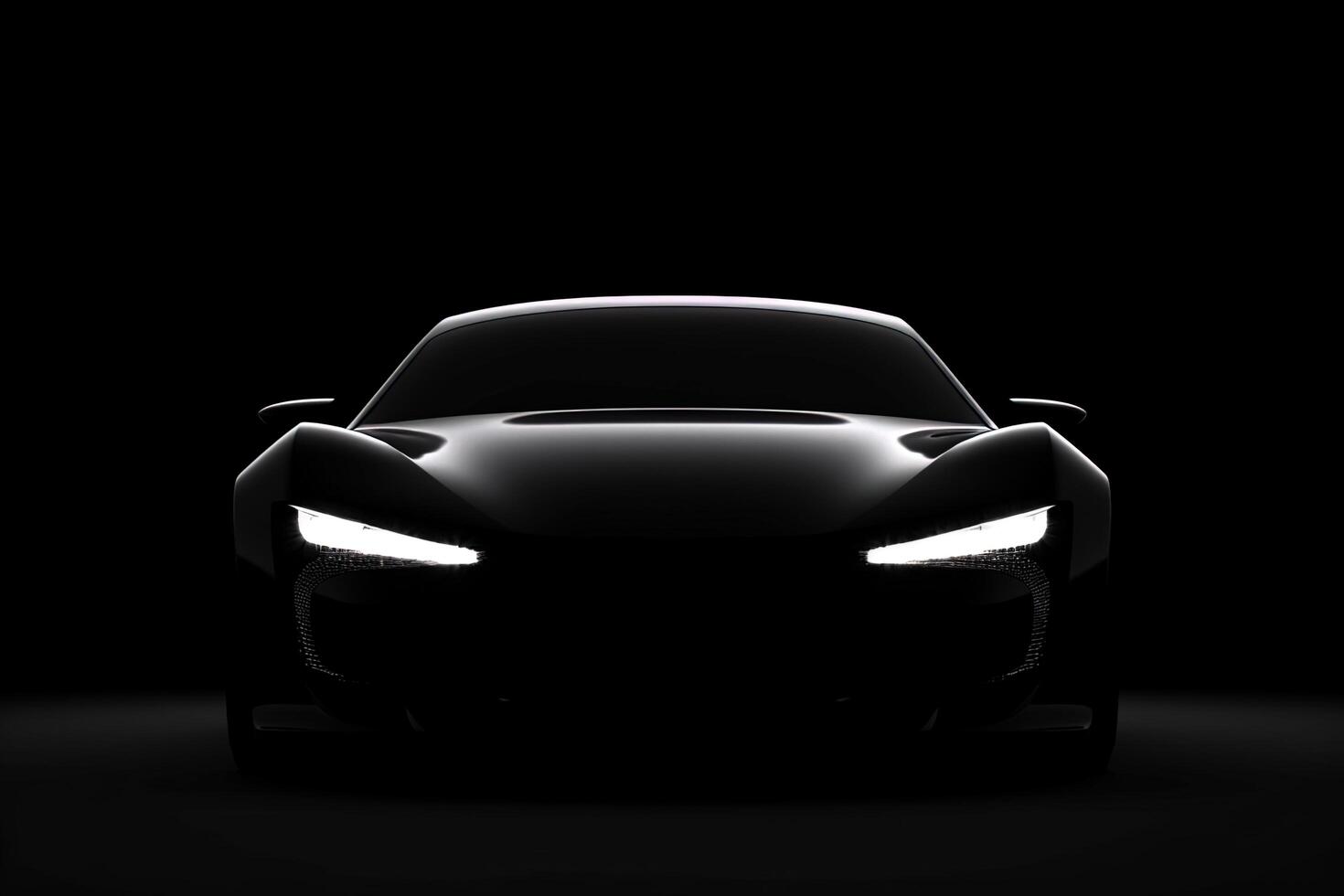 Front view dark silhouette of a modern sport black car isolated on black background. photo