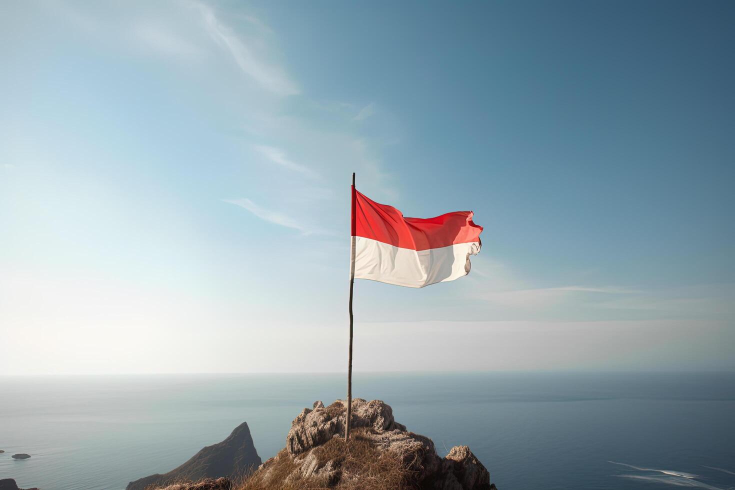 Indonesia national flag waving in the blue sky on the ocean background. Red and white flag with clouds. photo