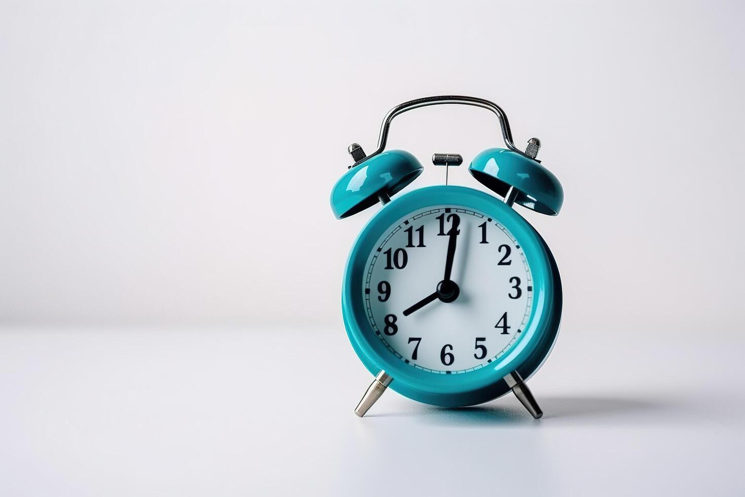 blue alarm clock on a white background. photo