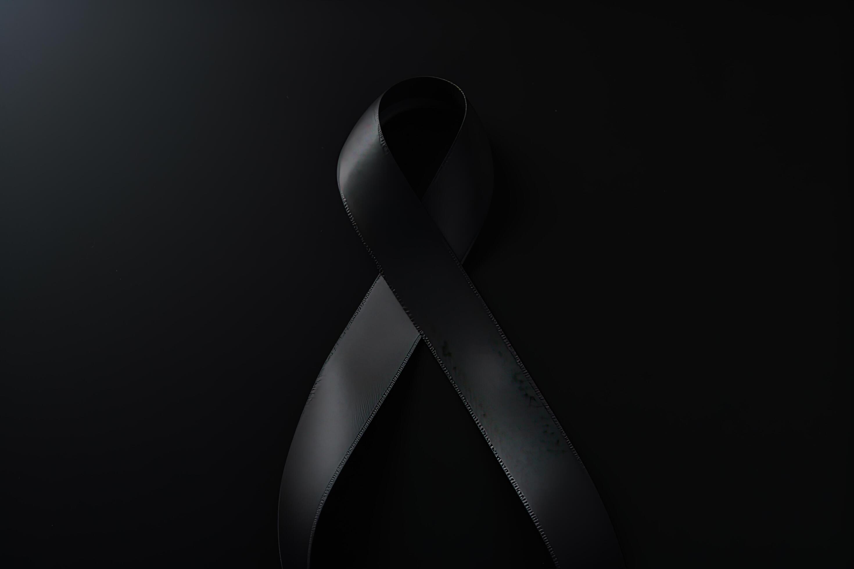 Black mourning ribbon with a dark background. AI Generated 23978340