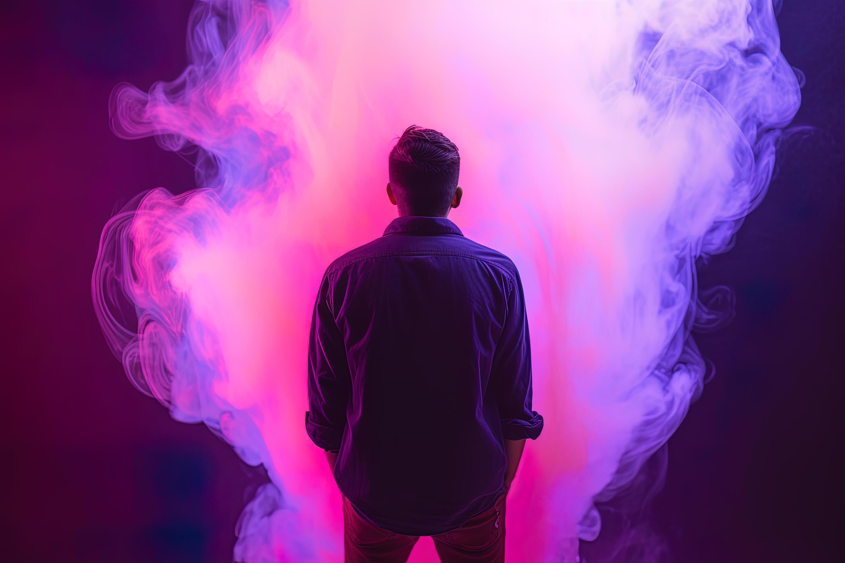 Premium Photo  Vape man exhales a cloud of steam neon light